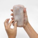 Skin-On - a creepy “leather” gadget case that responds to stroking, tickling and tweaking