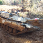 Main battle tank of the USA stuck in an ordinary puddle