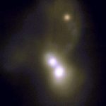 أظهر علماء الفلك اندماج مجرة ​​ثلاثية مع ثقبين أسودين عملاقين