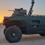 An unmanned vehicle with two machine guns works even with the engine off