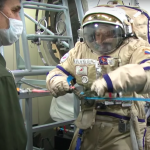The video showed the training of a Russian cosmonaut in a 100-kg spacesuit for landing on the moon