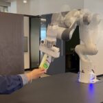 Look at the robotic arm that gently delivers and picks up items