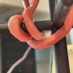 Look at a robot holding objects with its tentacles