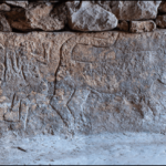 Neolithic erotica found in Turkey: a man holds a penis, and next to him are leopards