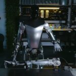 Tesla demonstrates Optimus humanoid breeding process