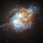 Hubble confirms the presence of the first double quasar at the dawn of the universe